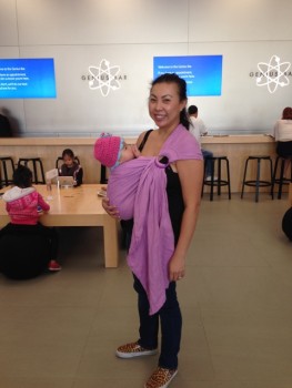 Waiting at the Apple Store with our Sleeping Baby Productions ring sling